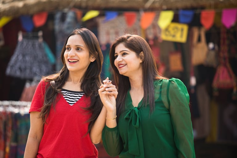 Two happy Indian women at market